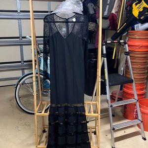 NWOT. Never worn. Sexy long black bodycon mermaid dress.